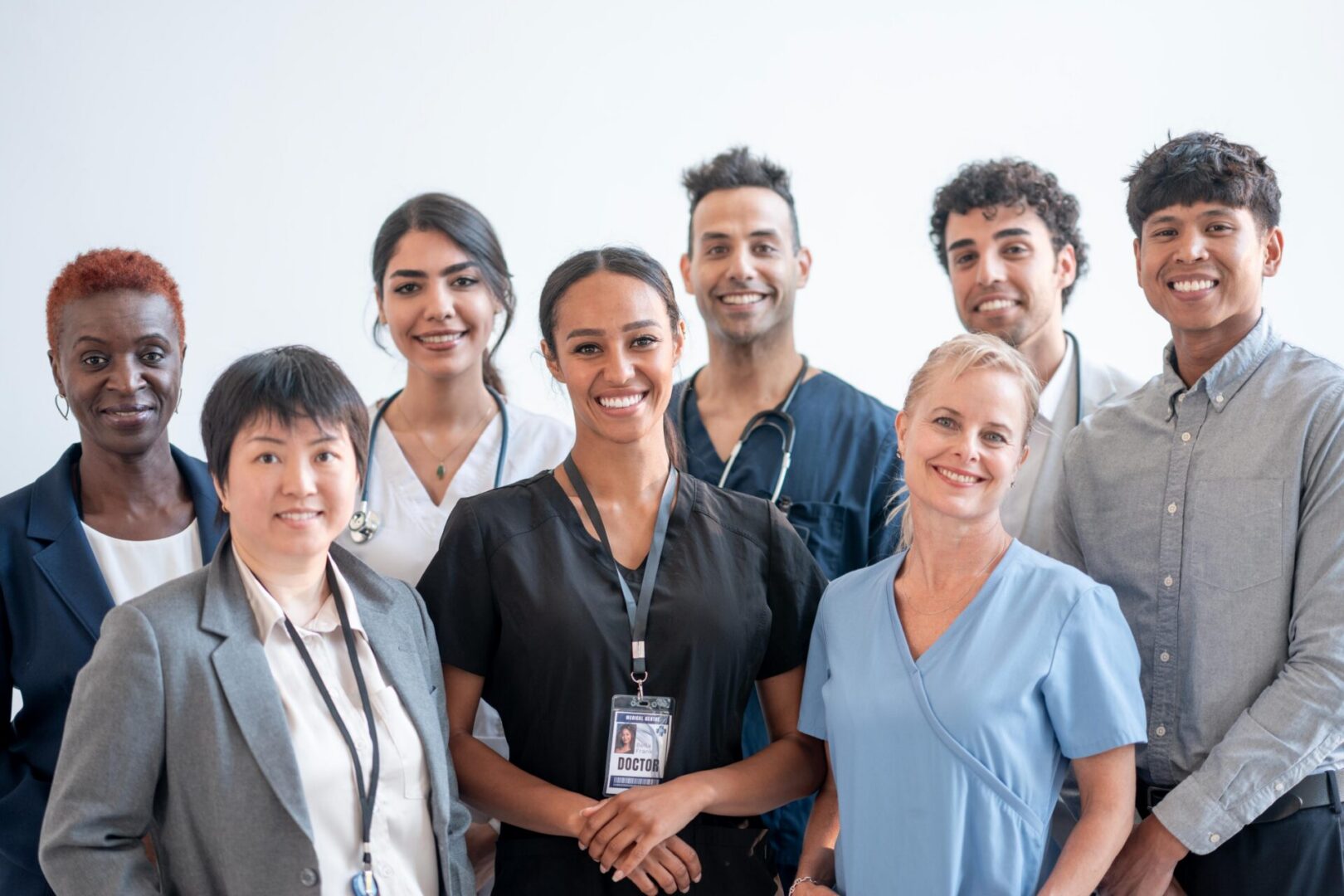 Diverse group of smiling medical professionals together.